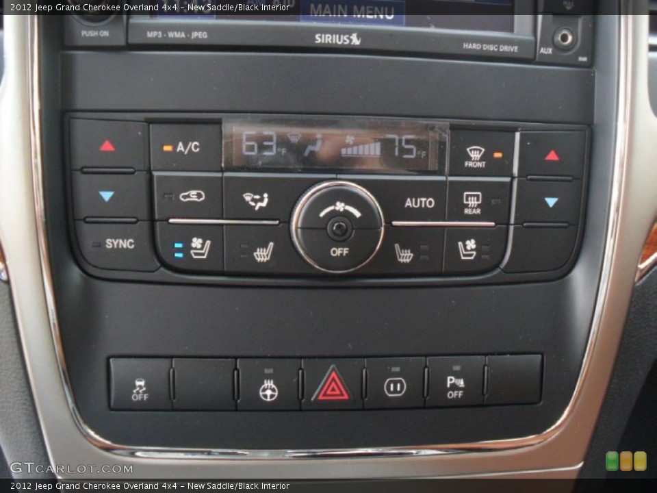 New Saddle/Black Interior Controls for the 2012 Jeep Grand Cherokee Overland 4x4 #56821975