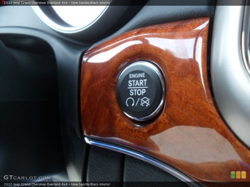 New Saddle/Black Interior Controls for the 2012 Jeep Grand Cherokee Overland 4x4 #56821987