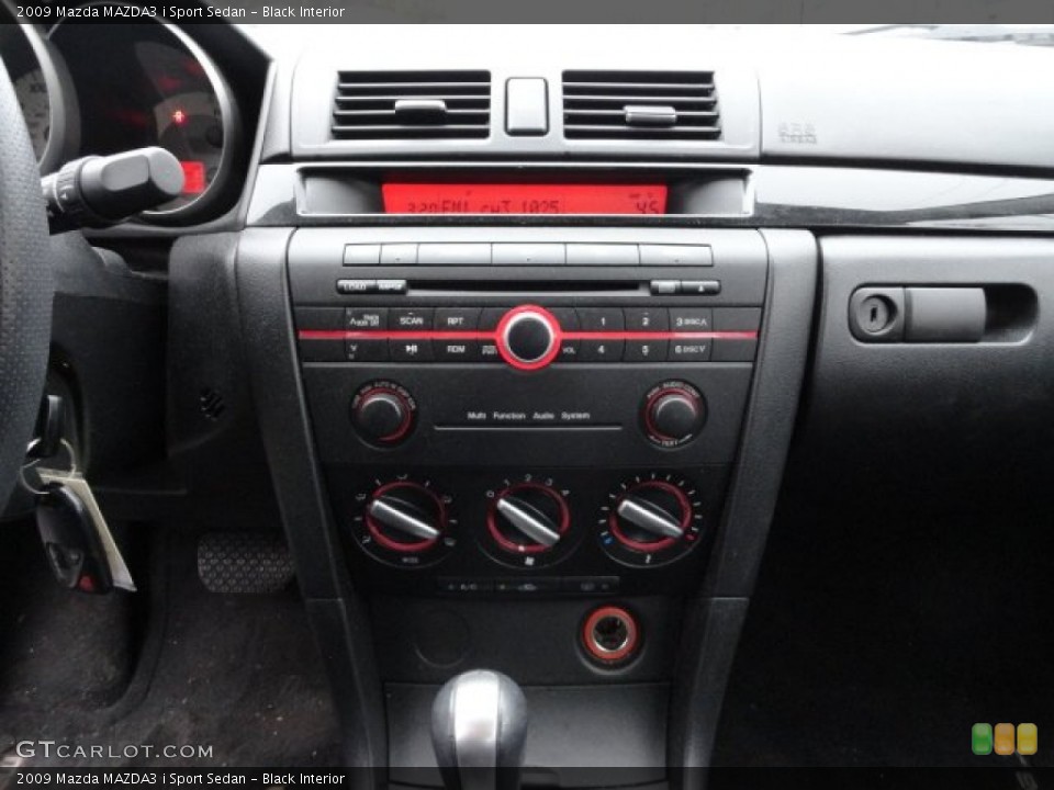 Black Interior Controls for the 2009 Mazda MAZDA3 i Sport Sedan #56842672