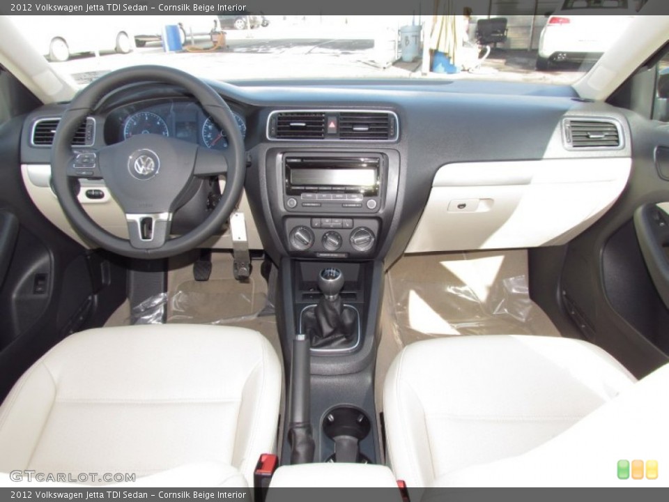 Cornsilk Beige Interior Dashboard for the 2012 Volkswagen Jetta TDI Sedan #56900169