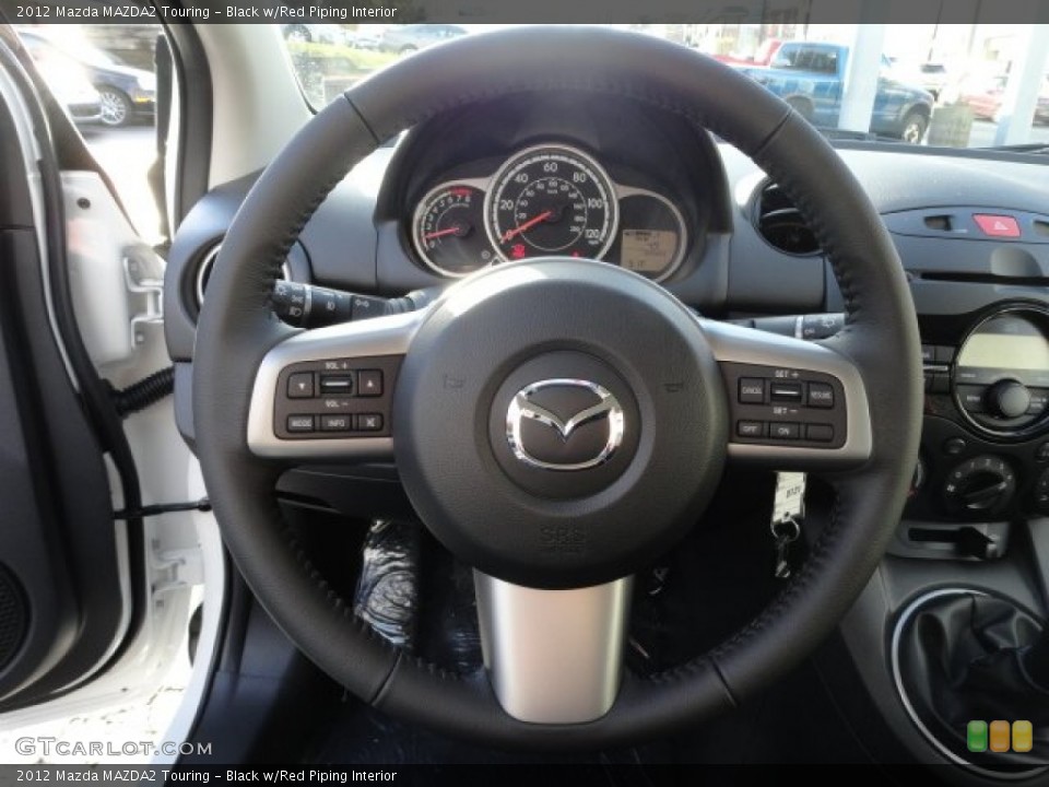 Black w/Red Piping Interior Steering Wheel for the 2012 Mazda MAZDA2 Touring #56928446