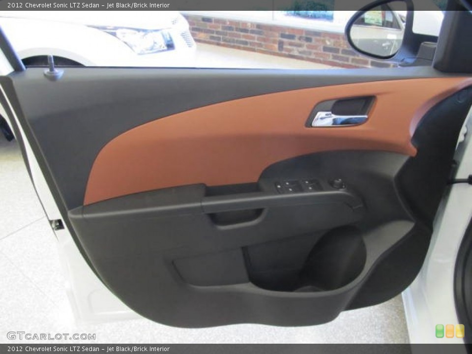 Jet Black/Brick Interior Door Panel for the 2012 Chevrolet Sonic LTZ Sedan #56941738