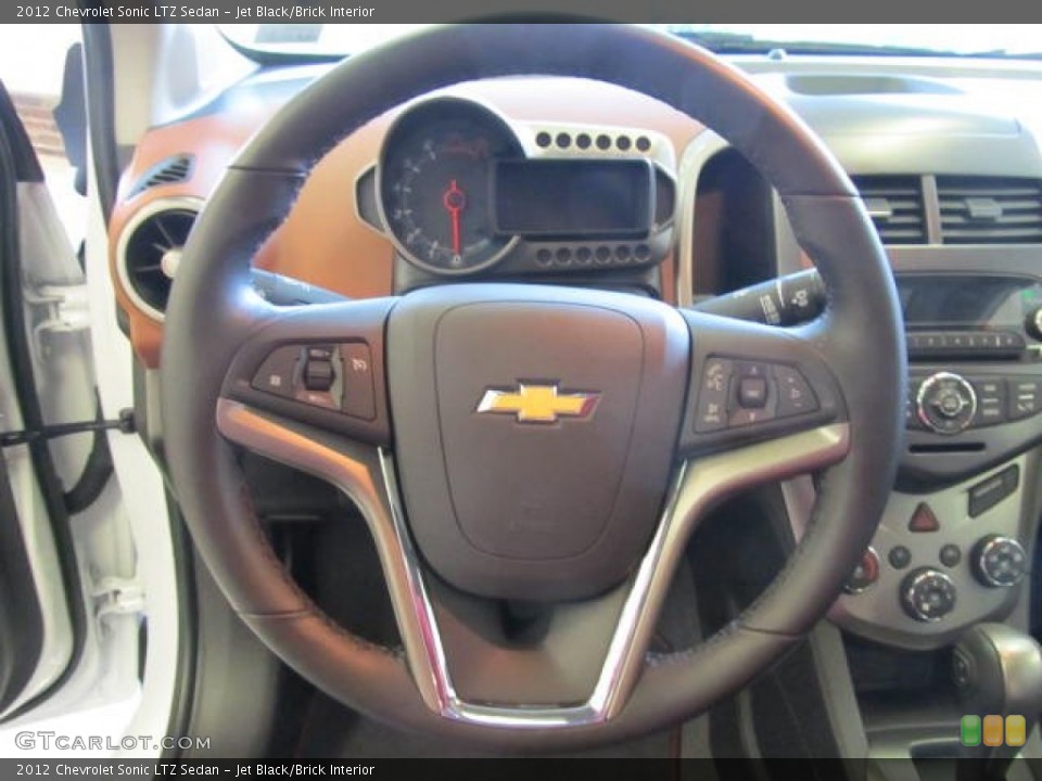 Jet Black/Brick Interior Steering Wheel for the 2012 Chevrolet Sonic LTZ Sedan #56941771