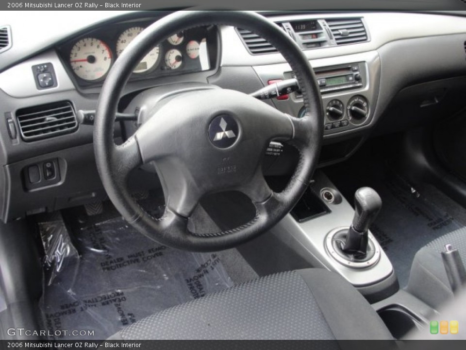 Black Interior Dashboard for the 2006 Mitsubishi Lancer OZ Rally #56988776