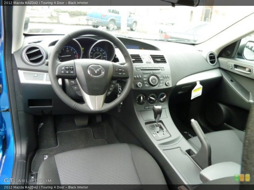 Black Interior Dashboard for the 2012 Mazda MAZDA3 i Touring 4 Door #57018122