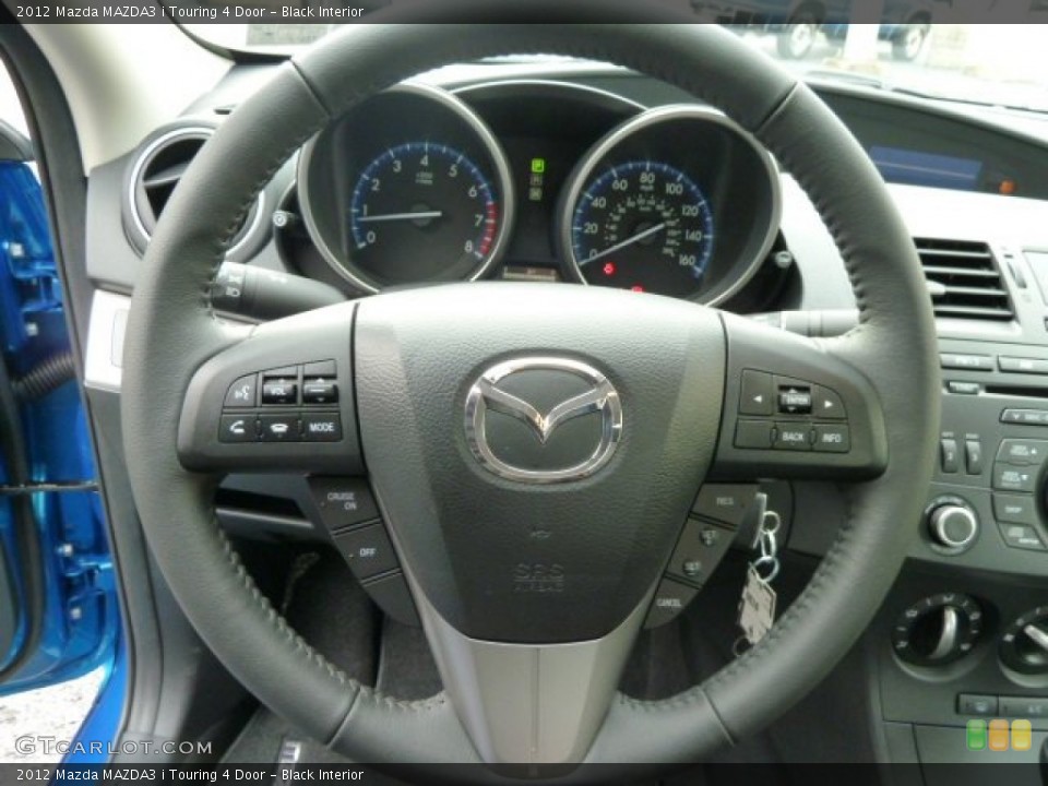 Black Interior Steering Wheel for the 2012 Mazda MAZDA3 i Touring 4 Door #57018176