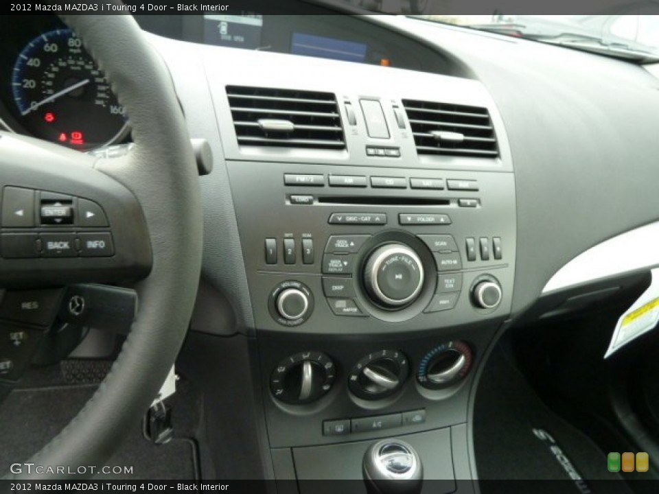 Black Interior Controls for the 2012 Mazda MAZDA3 i Touring 4 Door #57018194