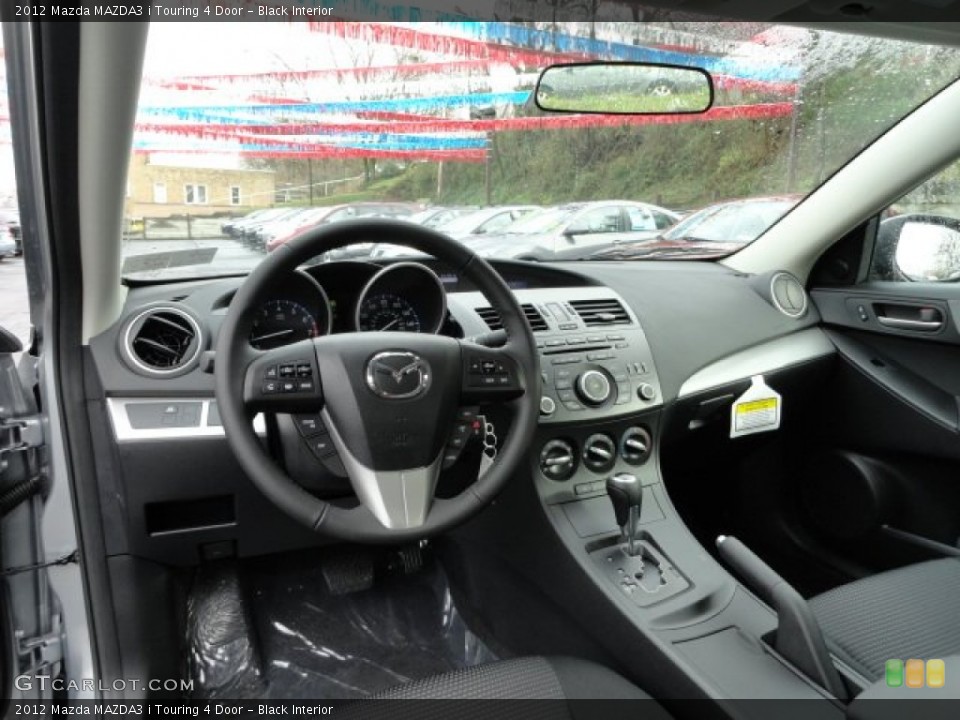 Black Interior Dashboard for the 2012 Mazda MAZDA3 i Touring 4 Door #57018317