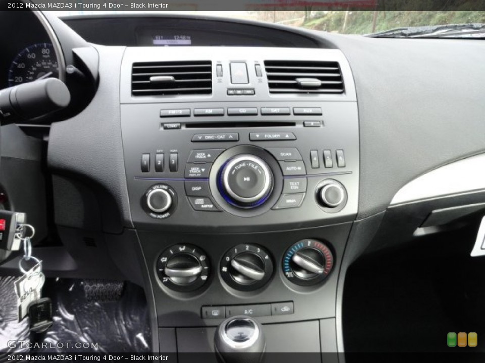Black Interior Controls for the 2012 Mazda MAZDA3 i Touring 4 Door #57018371