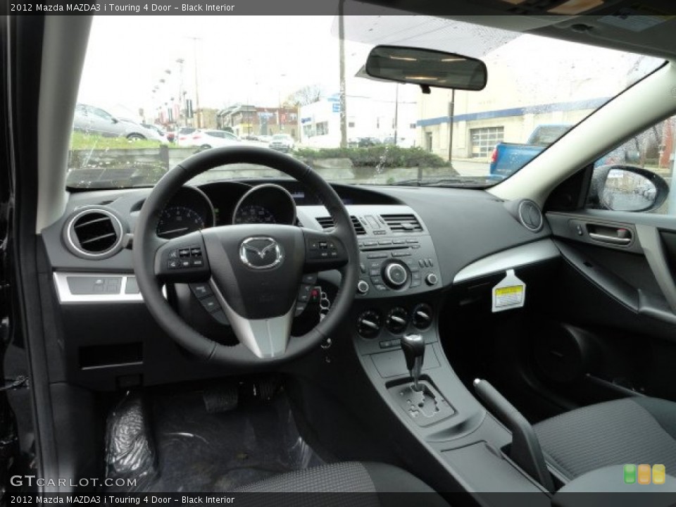 Black Interior Dashboard for the 2012 Mazda MAZDA3 i Touring 4 Door #57018496