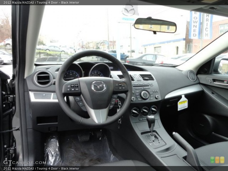 Black Interior Dashboard for the 2012 Mazda MAZDA3 i Touring 4 Door #57018680