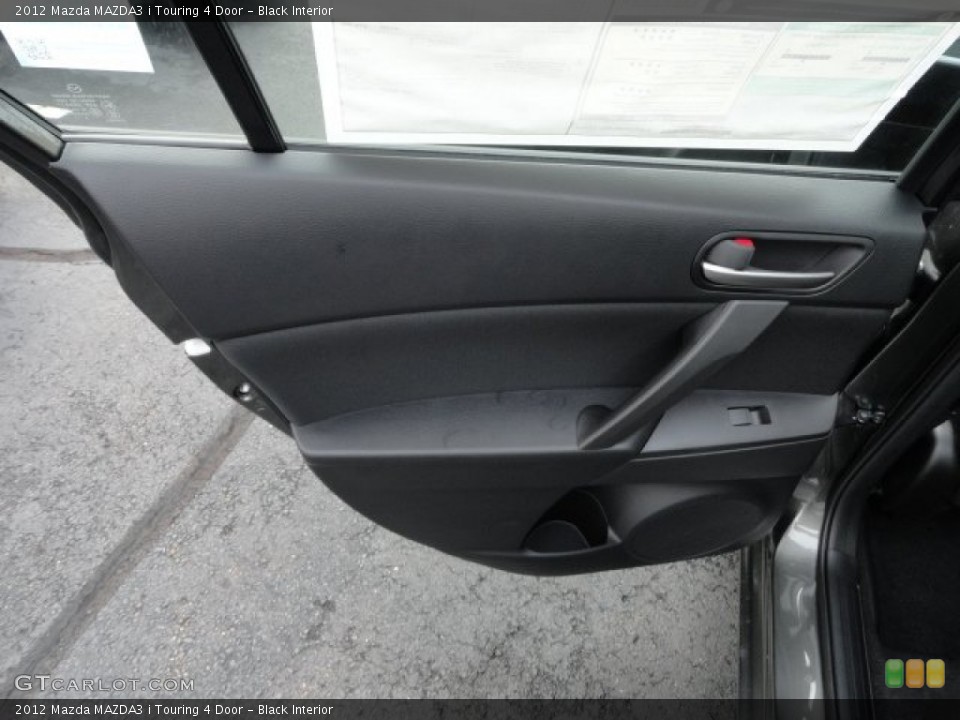 Black Interior Door Panel for the 2012 Mazda MAZDA3 i Touring 4 Door #57018689