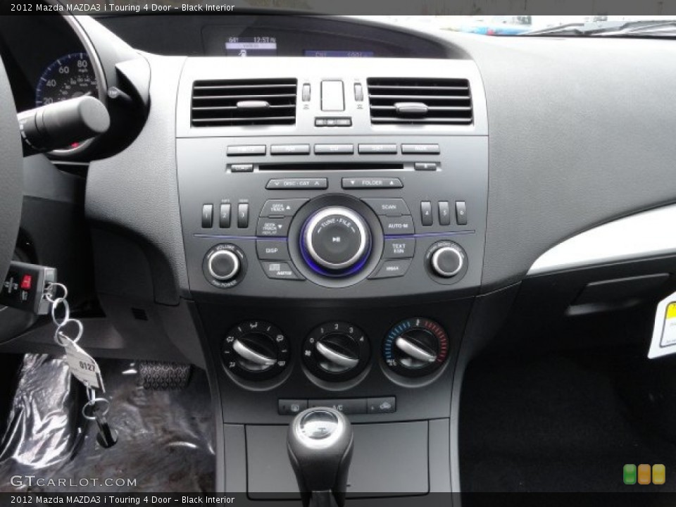 Black Interior Controls for the 2012 Mazda MAZDA3 i Touring 4 Door #57018737