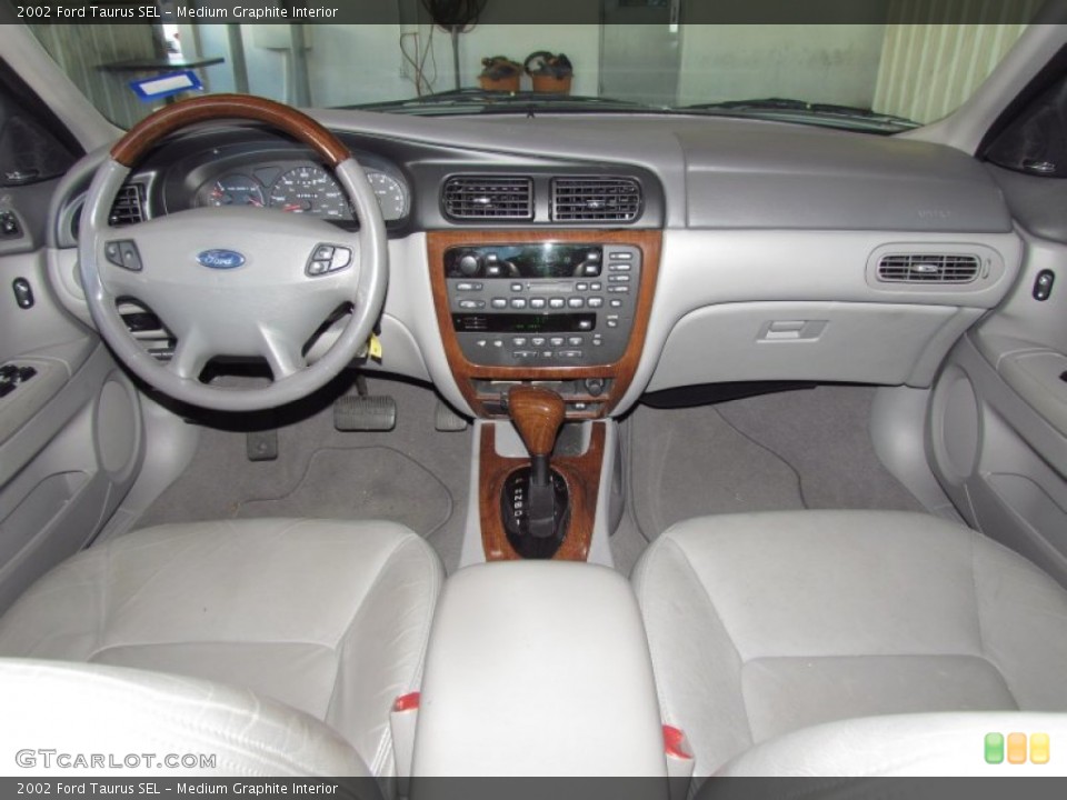 Medium Graphite Interior Dashboard for the 2002 Ford Taurus SEL #57041712
