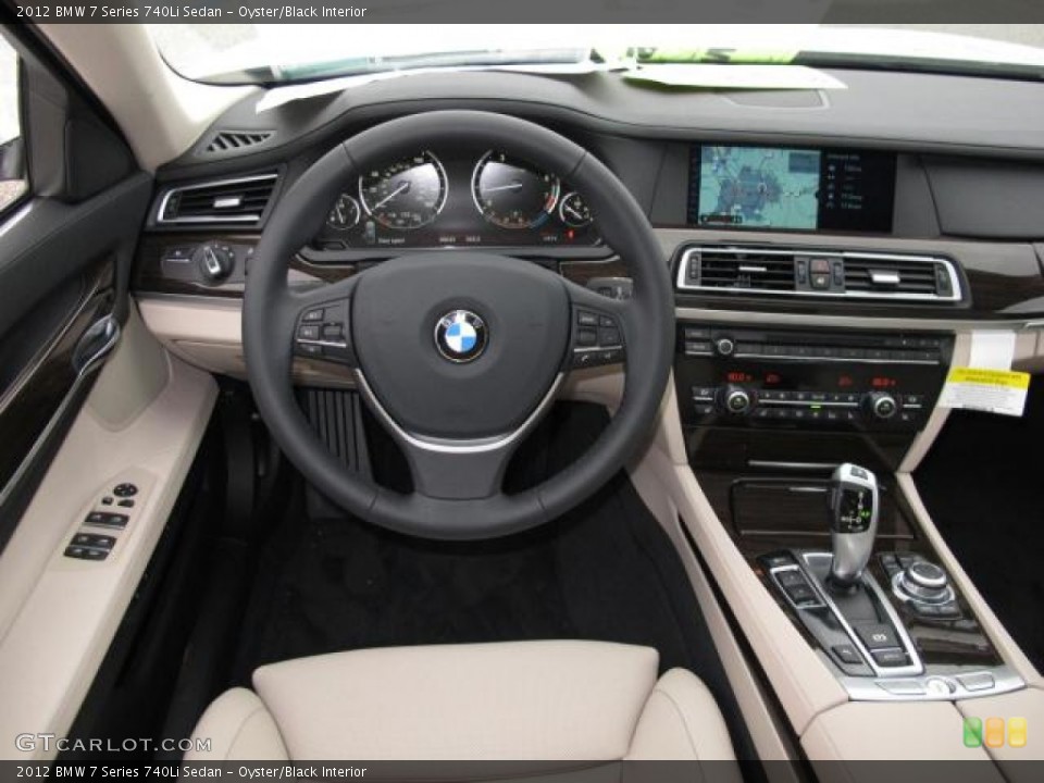 Oyster/Black Interior Steering Wheel for the 2012 BMW 7 Series 740Li Sedan #57065546