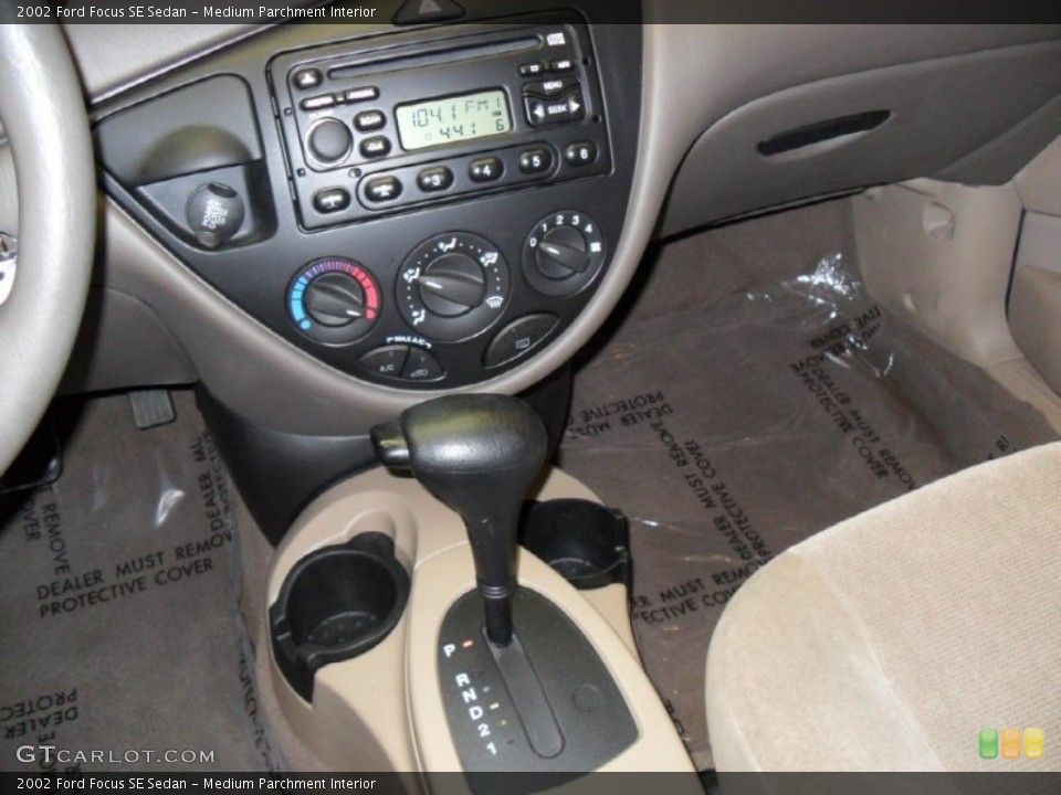 Medium Parchment Interior Controls for the 2002 Ford Focus SE Sedan #57085559