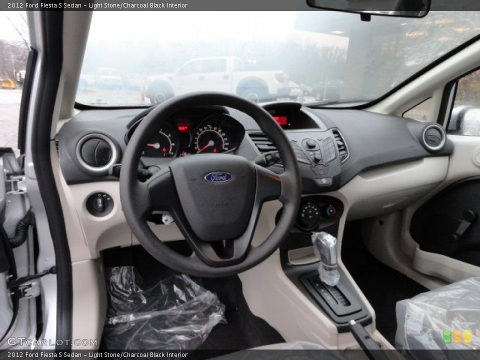 Light Stone/Charcoal Black Interior Dashboard for the 2012 Ford Fiesta S Sedan #57144539
