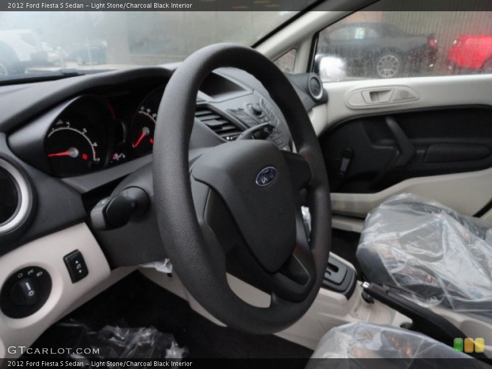 Light Stone/Charcoal Black Interior Steering Wheel for the 2012 Ford Fiesta S Sedan #57144571