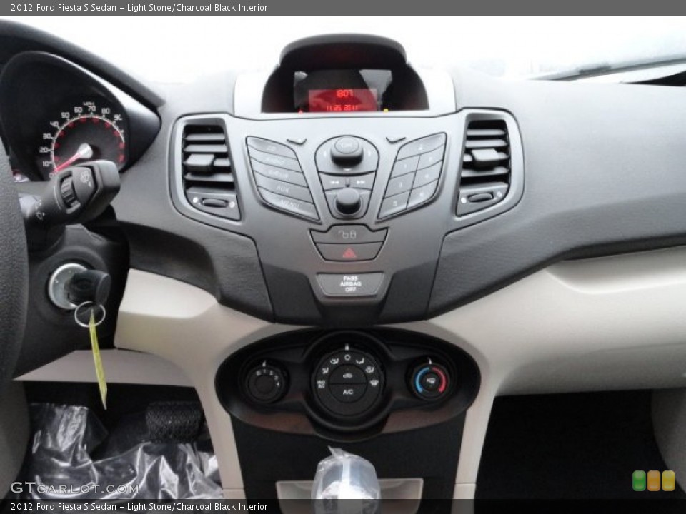Light Stone/Charcoal Black Interior Controls for the 2012 Ford Fiesta S Sedan #57144595
