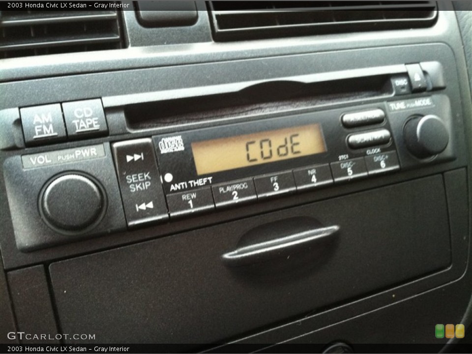 Gray Interior Audio System for the 2003 Honda Civic LX Sedan #57147742