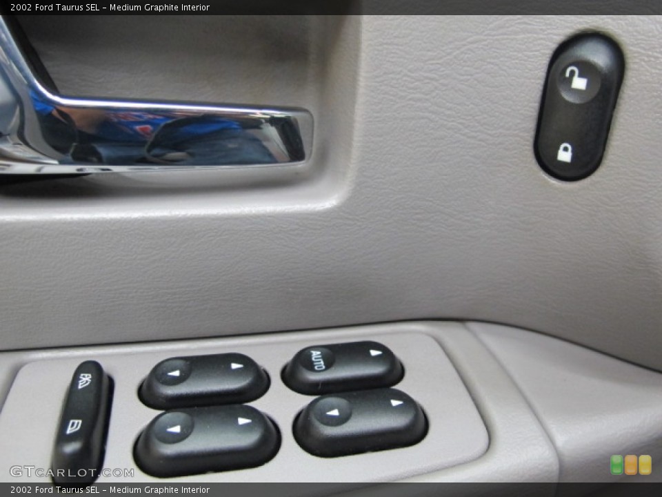 Medium Graphite Interior Controls for the 2002 Ford Taurus SEL #57150808