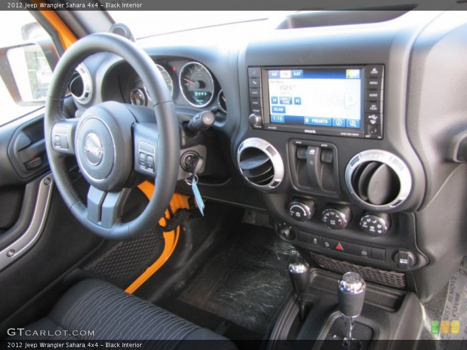 Black Interior Dashboard for the 2012 Jeep Wrangler Sahara 4x4 #57197669