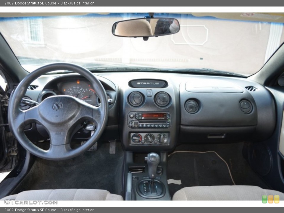 Black/Beige Interior Dashboard for the 2002 Dodge Stratus SE Coupe #57200614