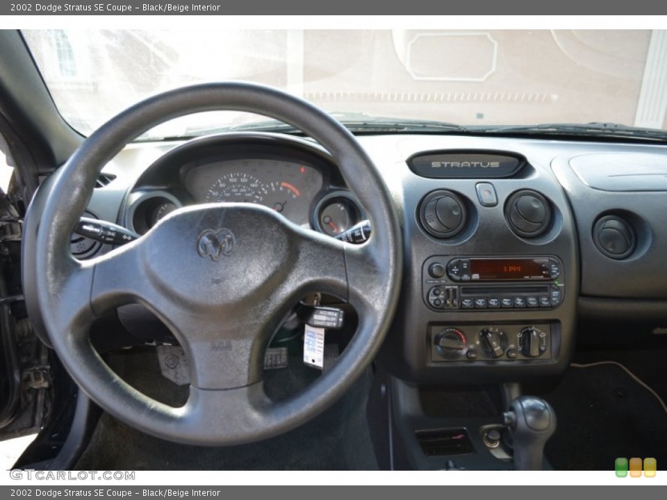 Black/Beige Interior Dashboard for the 2002 Dodge Stratus SE Coupe #57200623