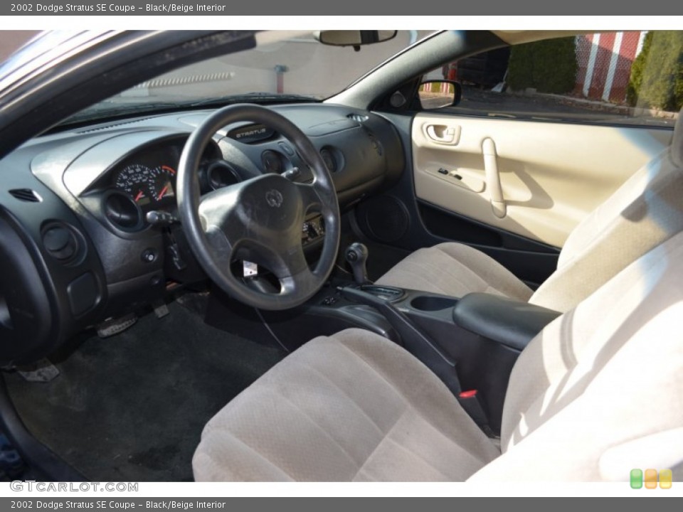 Black/Beige Interior Photo for the 2002 Dodge Stratus SE Coupe #57200658