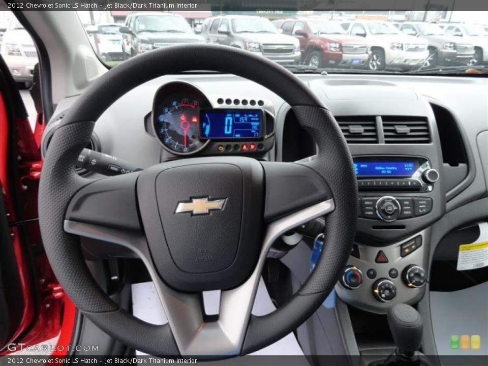 Jet Black/Dark Titanium Interior Steering Wheel for the 2012 Chevrolet Sonic LS Hatch #57225865