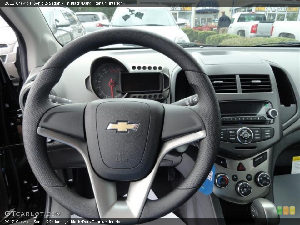 Jet Black/Dark Titanium Interior Steering Wheel for the 2012 Chevrolet Sonic LS Sedan #57225922