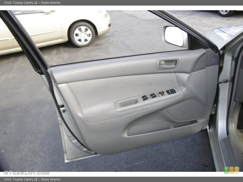 Stone Interior Door Panel for the 2002 Toyota Camry LE #57261257