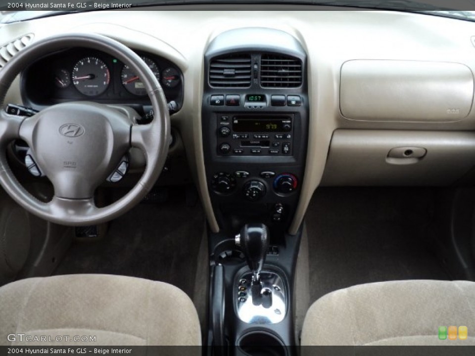 Beige Interior Dashboard for the 2004 Hyundai Santa Fe GLS #57308136