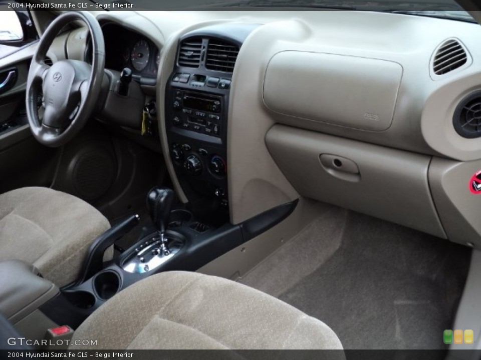 Beige Interior Dashboard for the 2004 Hyundai Santa Fe GLS #57308178