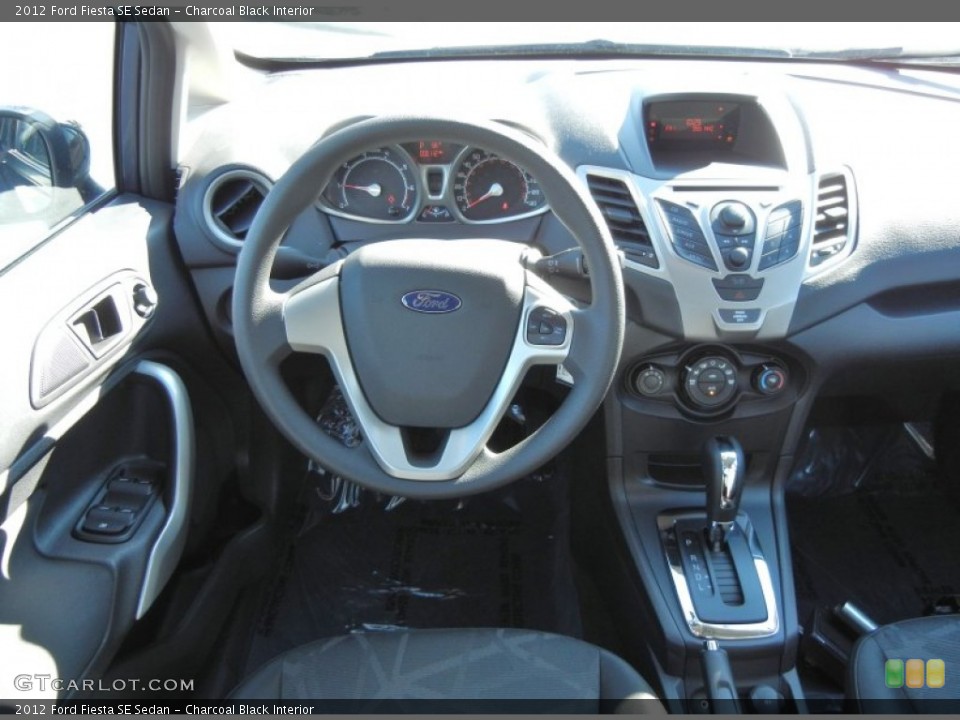 Charcoal Black Interior Dashboard for the 2012 Ford Fiesta SE Sedan #57331173