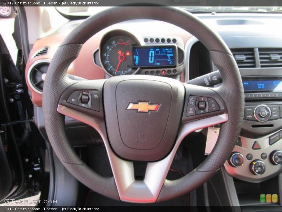 Jet Black/Brick Interior Steering Wheel for the 2012 Chevrolet Sonic LT Sedan #57336114