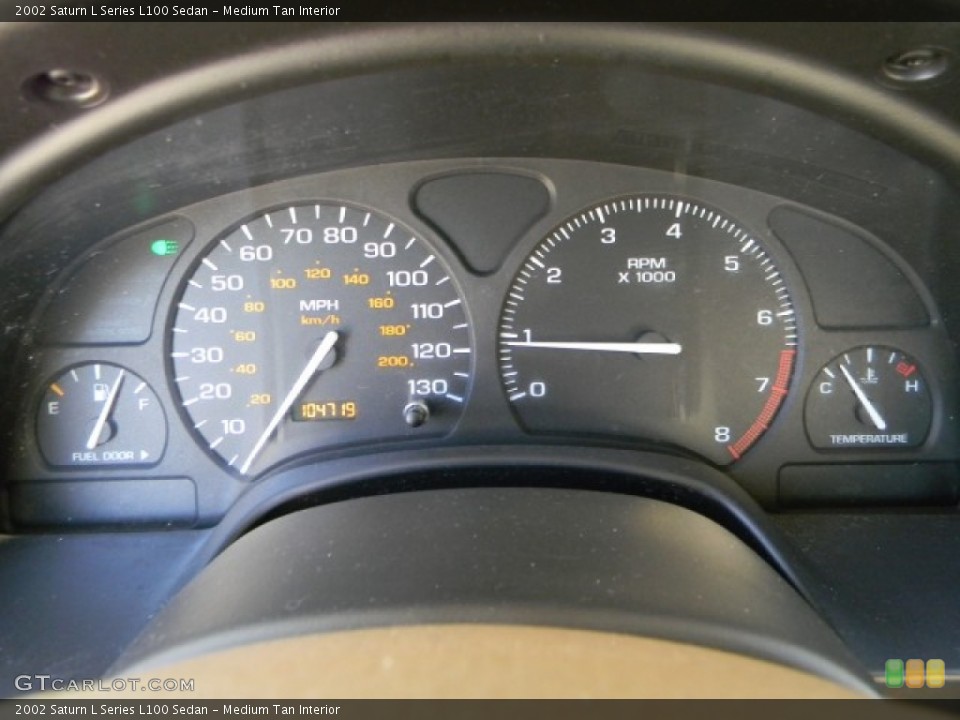 Medium Tan Interior Gauges for the 2002 Saturn L Series L100 Sedan #57336753