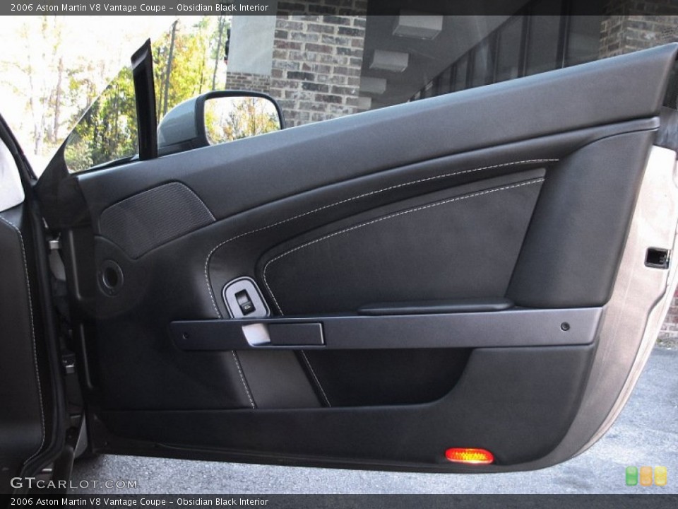 Obsidian Black Interior Door Panel for the 2006 Aston Martin V8 Vantage Coupe #57340421