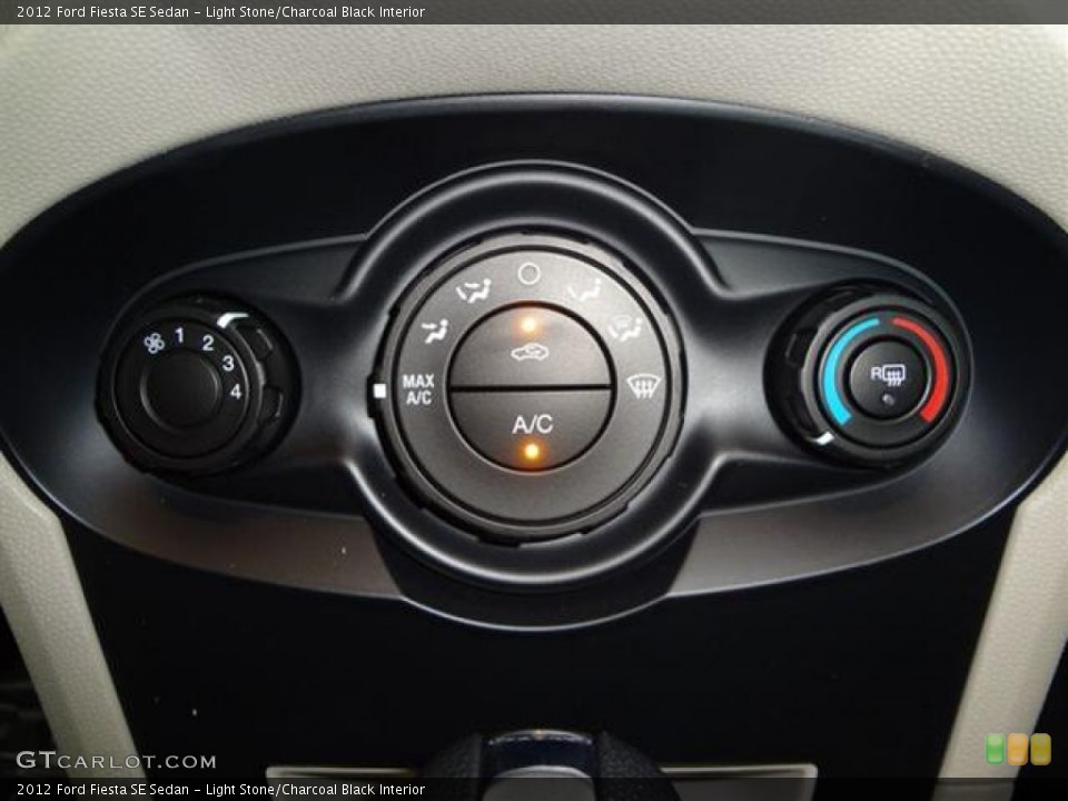 Light Stone/Charcoal Black Interior Controls for the 2012 Ford Fiesta SE Sedan #57402653