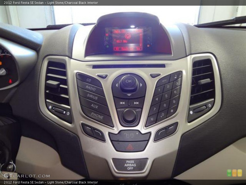 Light Stone/Charcoal Black Interior Controls for the 2012 Ford Fiesta SE Sedan #57402662