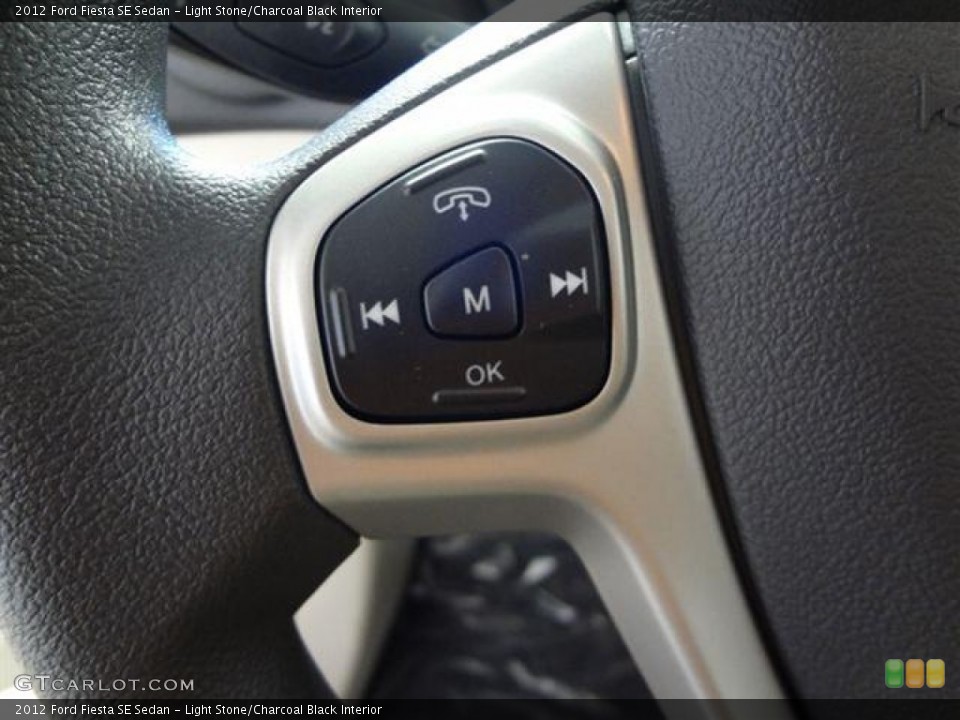 Light Stone/Charcoal Black Interior Controls for the 2012 Ford Fiesta SE Sedan #57402677