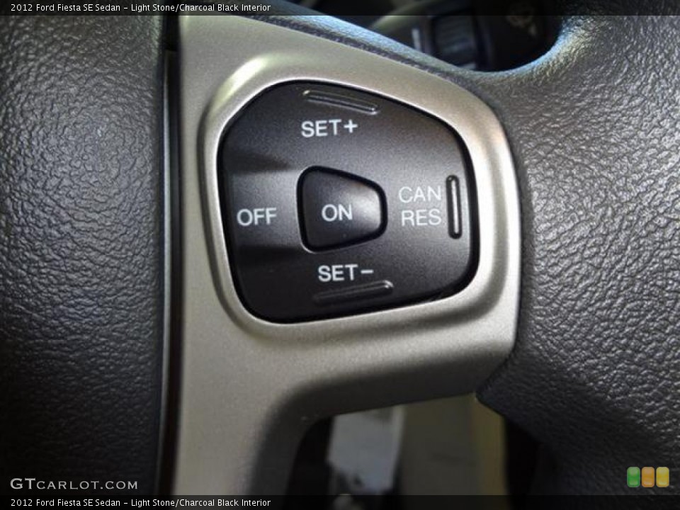 Light Stone/Charcoal Black Interior Controls for the 2012 Ford Fiesta SE Sedan #57402686