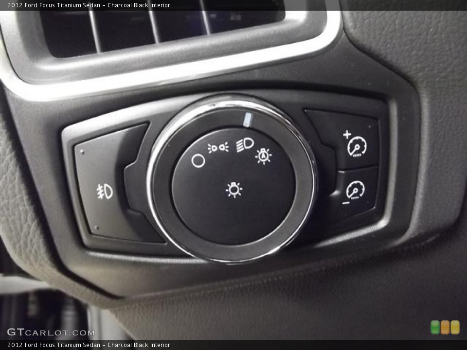 Charcoal Black Interior Controls for the 2012 Ford Focus Titanium Sedan #57405890