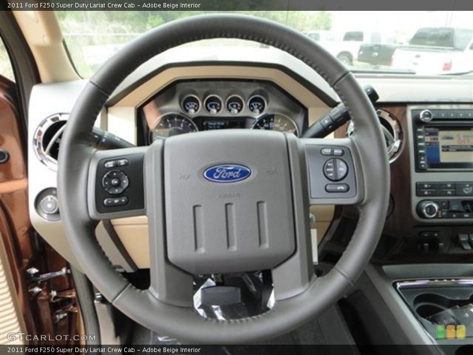 Adobe Beige Interior Steering Wheel for the 2011 Ford F250 Super Duty Lariat Crew Cab #57408902