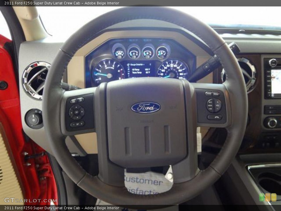 Adobe Beige Interior Steering Wheel for the 2011 Ford F250 Super Duty Lariat Crew Cab #57411860