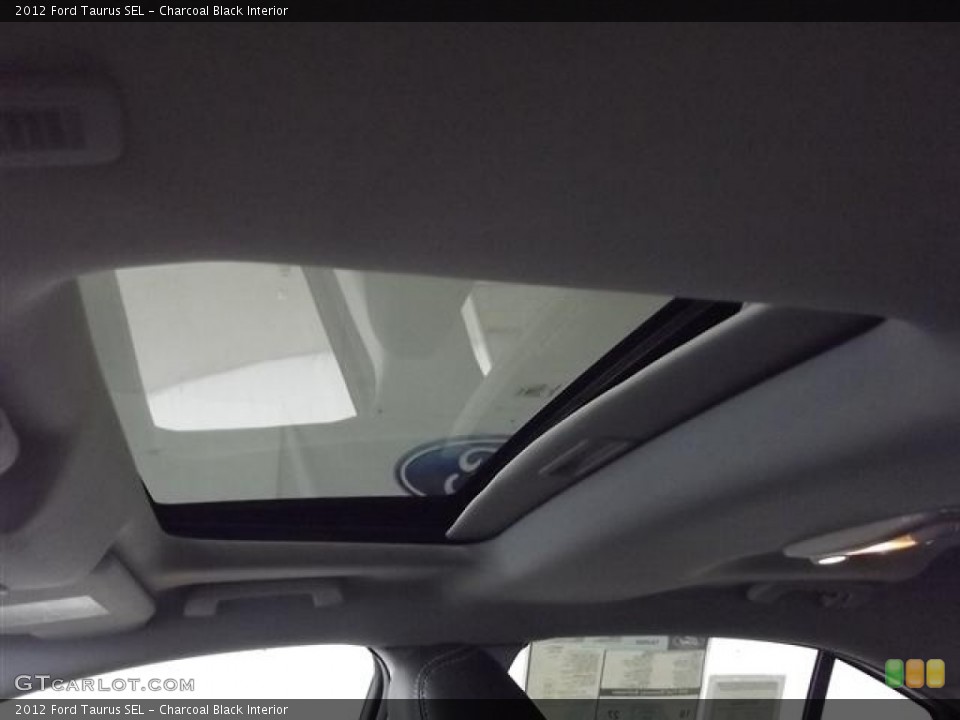 Charcoal Black Interior Sunroof for the 2012 Ford Taurus SEL #57422732