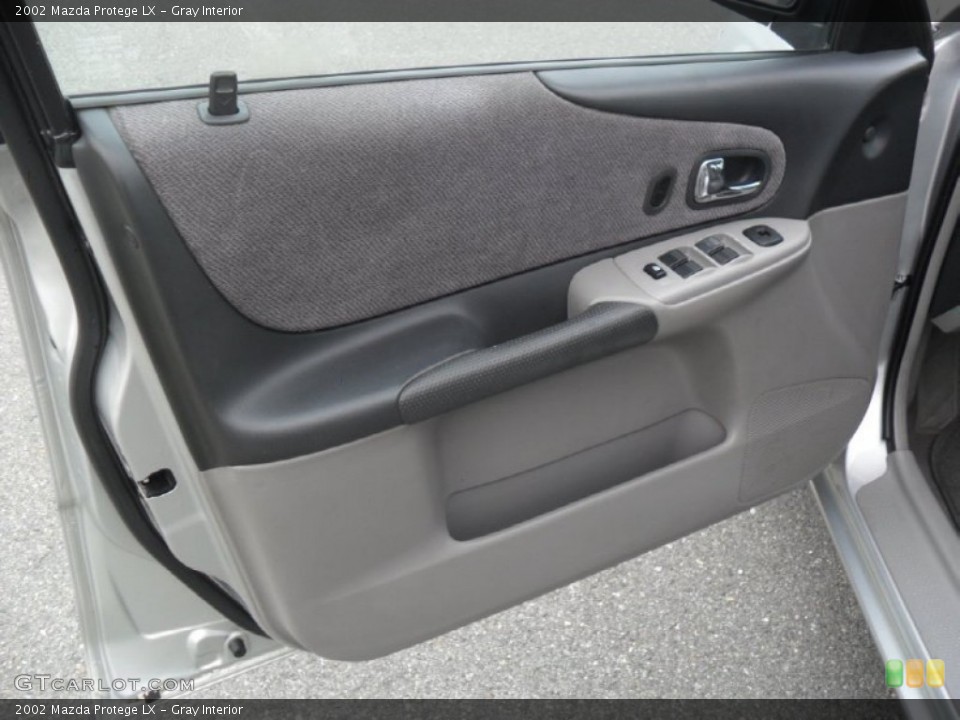 Gray Interior Door Panel for the 2002 Mazda Protege LX #57477611