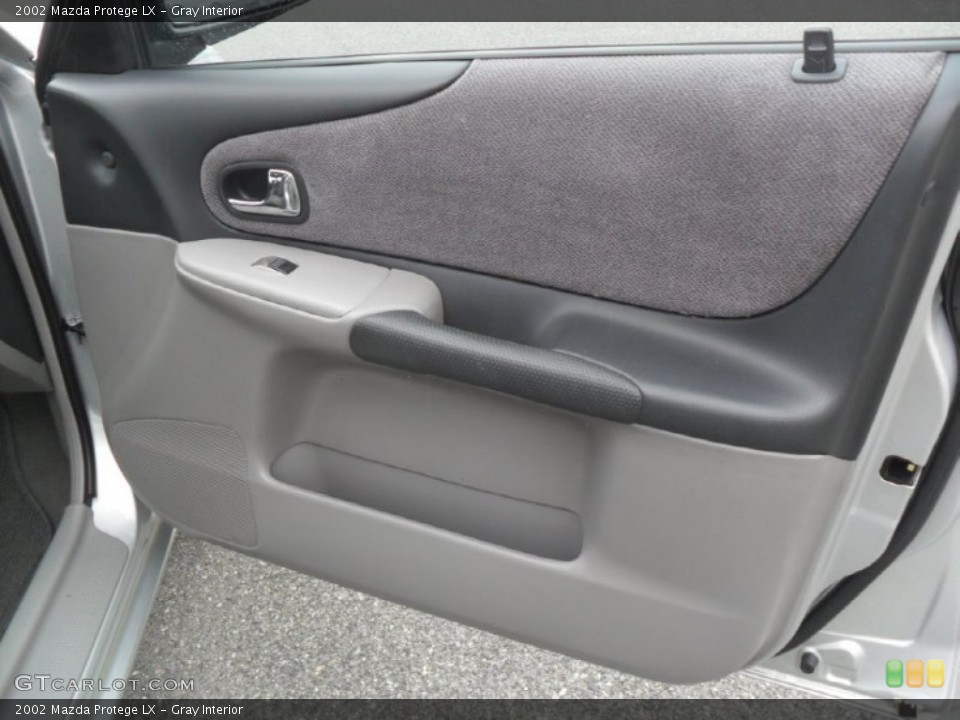Gray Interior Door Panel for the 2002 Mazda Protege LX #57477721