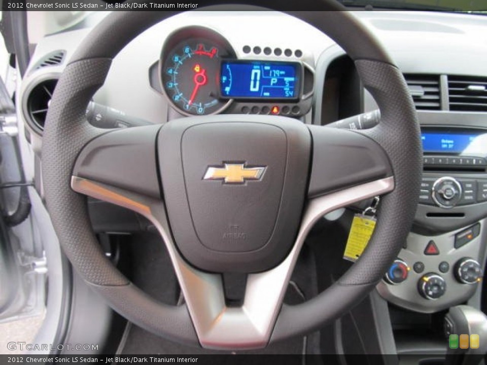 Jet Black/Dark Titanium Interior Steering Wheel for the 2012 Chevrolet Sonic LS Sedan #57495725