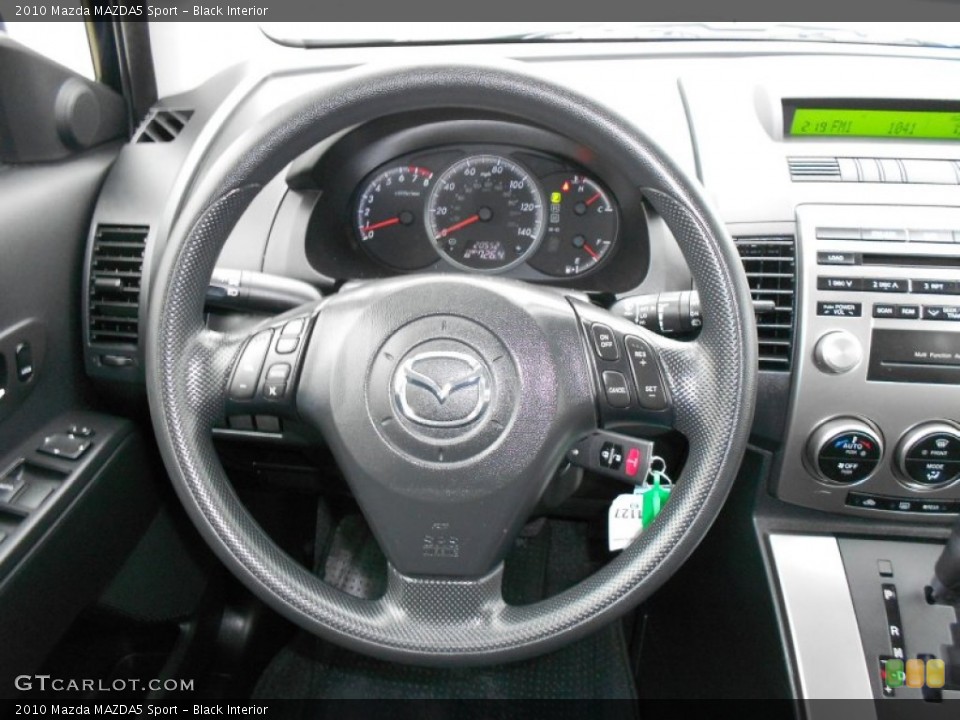 Black Interior Steering Wheel for the 2010 Mazda MAZDA5 Sport #57500923
